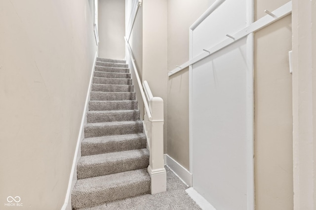 1418 S 7th St, Terre Haute, IN 47802 - stairs with baseboards and carpet flooring
