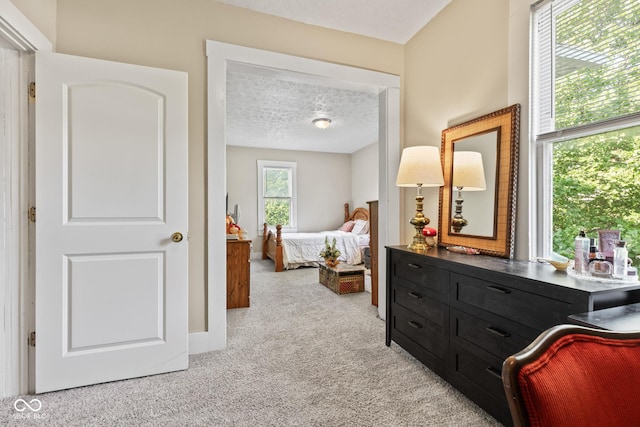 1418 S 7th St, Terre Haute, IN 47802 - bedroom with a textured ceiling and light colored carpet
