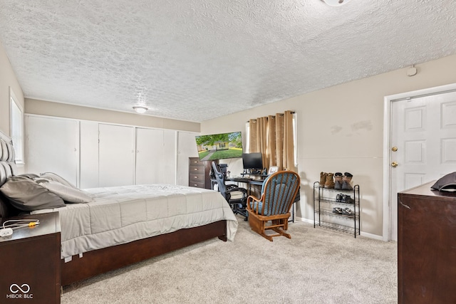1418 S 7th St, Terre Haute, IN 47802 - carpeted bedroom featuring a textured ceiling, an office area, and a closet