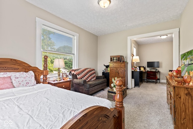 1418 S 7th St, Terre Haute, IN 47802 - bedroom featuring light colored carpet and a textured ceiling