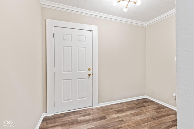 1418 S 7th St, Terre Haute, IN 47802 - empty room featuring crown molding and wood finished floors