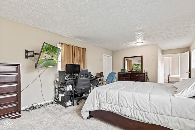 1418 S 7th St, Terre Haute, IN 47802 - carpeted bedroom with a textured ceiling and an office area