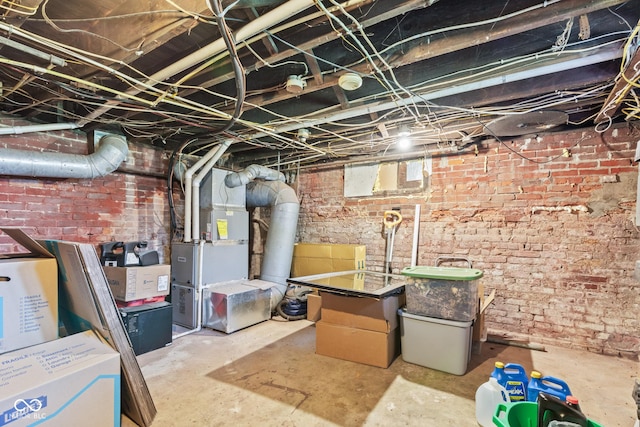1418 S 7th St, Terre Haute, IN 47802 - unfinished basement featuring brick wall and heating unit