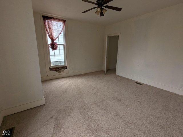 347 E Mechanic St E, Shelbyville, IN 46176 - empty room with ceiling fan and light colored carpet