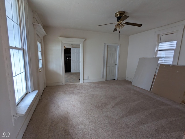 347 E Mechanic St E, Shelbyville, IN 46176 - spare room featuring a ceiling fan and light carpet