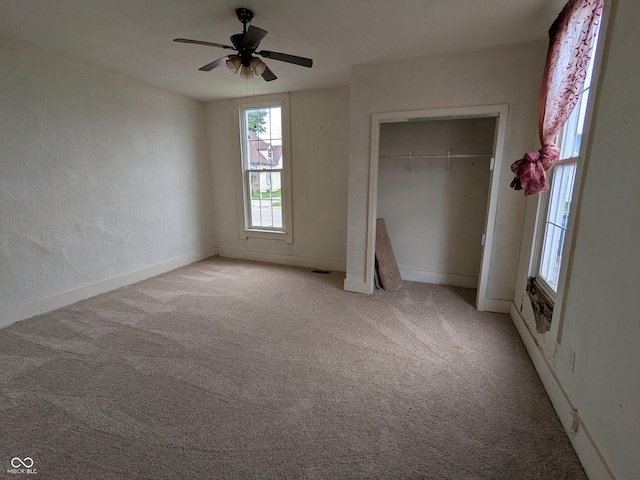 347 E Mechanic St E, Shelbyville, IN 46176 - unfurnished bedroom featuring carpet floors, a closet, and a ceiling fan