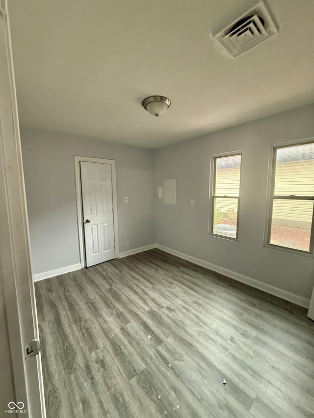 4024 Zinfandel Way, Indianapolis, IN 46254 - spare room with wood finished floors and baseboards