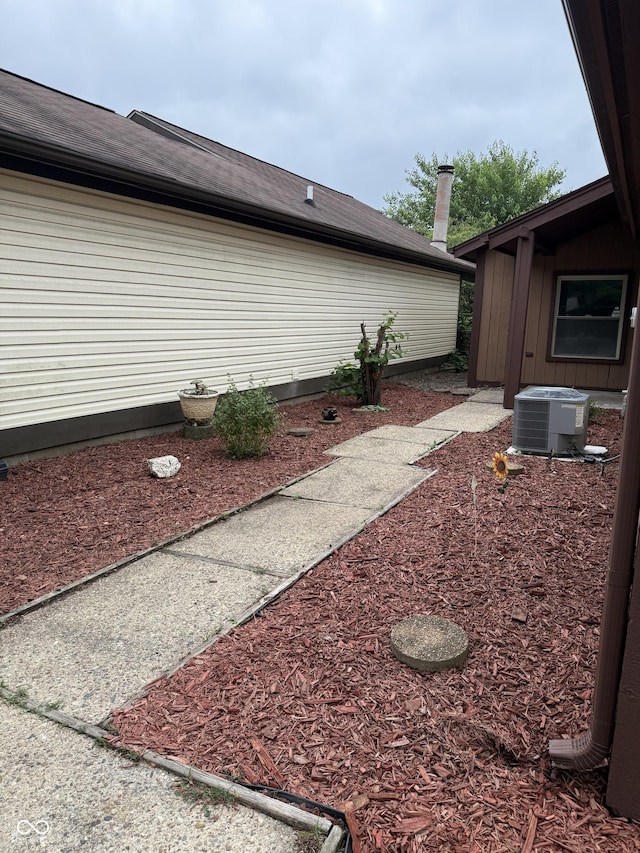 4024 Zinfandel Way, Indianapolis, IN 46254 - view of side of home featuring a central air condition unit