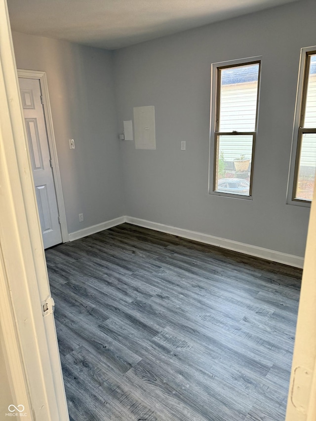 4024 Zinfandel Way, Indianapolis, IN 46254 - spare room with dark wood-style floors and baseboards
