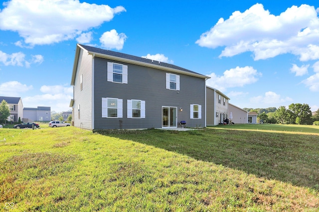 2738 Pointe Club Rd, Indianapolis, IN 46229 - back of house featuring a yard and a patio area