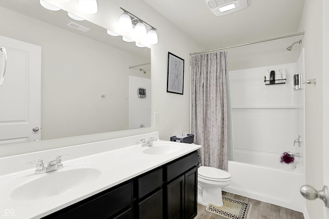 2738 Pointe Club Rd, Indianapolis, IN 46229 - full bathroom featuring shower / bathtub combination with curtain, wood finished floors, and double vanity