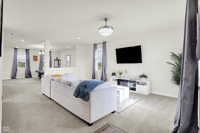 2738 Pointe Club Rd, Indianapolis, IN 46229 - living room featuring carpet flooring, recessed lighting, and a chandelier