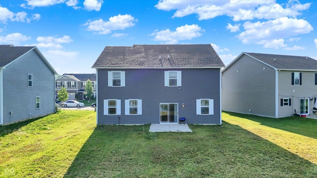 2738 Pointe Club Rd, Indianapolis, IN 46229 - back of property with a patio area and a lawn
