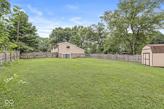 6241 S Meridian St, Indianapolis, IN 46217 - fenced backyard with a storage shed and view of scattered trees