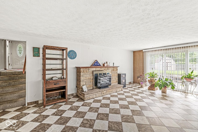 6241 S Meridian St, Indianapolis, IN 46217 - living room with a wood stove and a textured ceiling