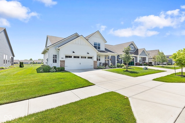 19677 Sumrall Pl, Westfield, IN 46074 - view of front of house with driveway, board and batten siding, brick siding, and a front yard