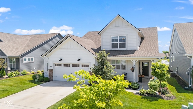 19677 Sumrall Pl, Westfield, IN 46074 - craftsman inspired home with board and batten siding, a front lawn, an attached garage, and a shingled roof