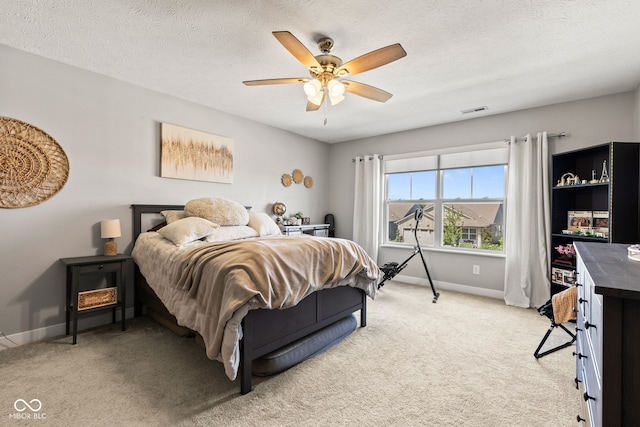 19677 Sumrall Pl, Westfield, IN 46074 - bedroom with light colored carpet, a ceiling fan, and a textured ceiling