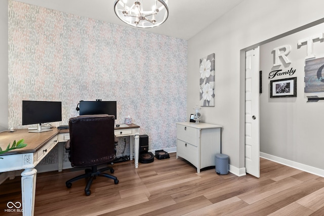 19677 Sumrall Pl, Westfield, IN 46074 - office area with wood finished floors, a chandelier, and wallpapered walls