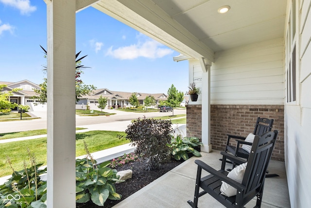 19677 Sumrall Pl, Westfield, IN 46074 - covered porch with a residential view and a yard