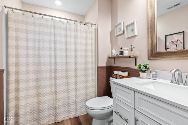 19677 Sumrall Pl, Westfield, IN 46074 - bathroom featuring vanity, a wainscoted wall, wood finished floors, and a shower with shower curtain