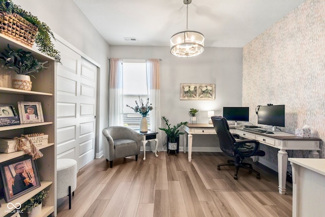 19677 Sumrall Pl, Westfield, IN 46074 - office featuring light wood-type flooring, a chandelier, and wallpapered walls