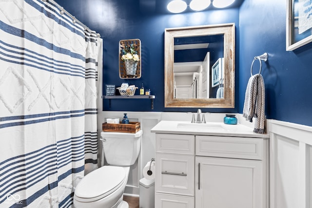 19677 Sumrall Pl, Westfield, IN 46074 - full bathroom with wainscoting, vanity, and a decorative wall