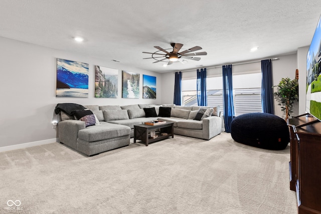 19677 Sumrall Pl, Westfield, IN 46074 - carpeted living room with ceiling fan, recessed lighting, and a textured ceiling