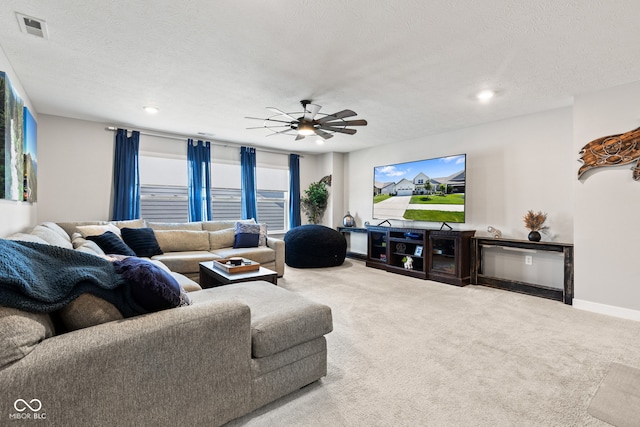 19677 Sumrall Pl, Westfield, IN 46074 - carpeted living area featuring a ceiling fan, recessed lighting, and a textured ceiling