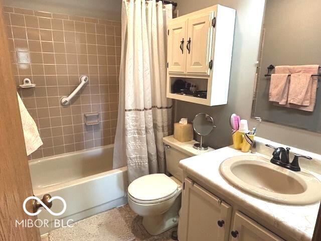 11 Mccutcheon Dr, Lafayette, IN 47909 - bathroom with vanity and shower / bathtub combination with curtain