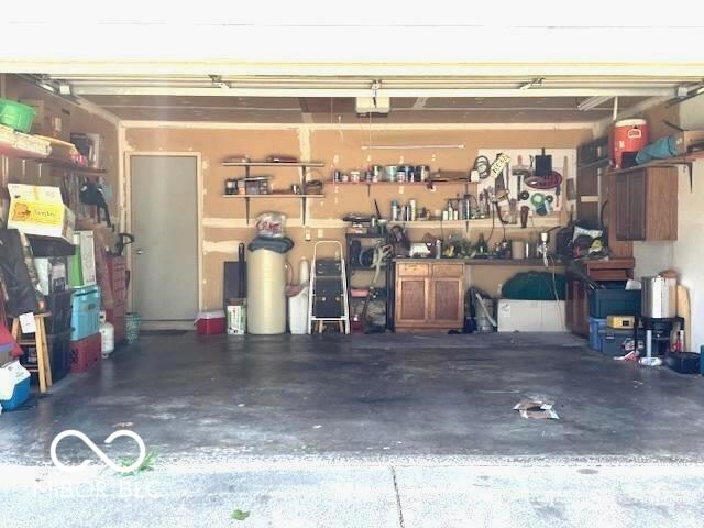 11 Mccutcheon Dr, Lafayette, IN 47909 - garage with a garage door opener