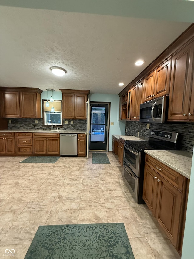 11698 N Bethesda Rd, Mooresville, IN 46158 - kitchen featuring stainless steel appliances, decorative backsplash, and recessed lighting