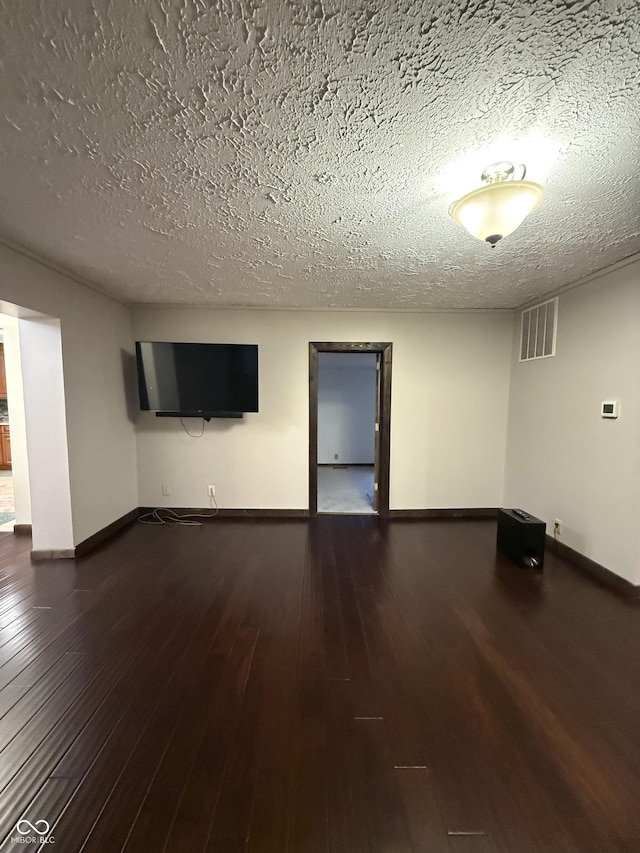 11698 N Bethesda Rd, Mooresville, IN 46158 - spare room featuring a textured ceiling and wood finished floors