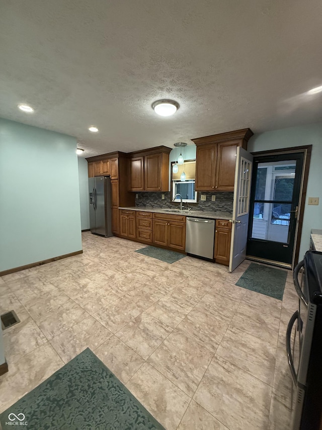 11698 N Bethesda Rd, Mooresville, IN 46158 - kitchen featuring stainless steel dishwasher, refrigerator with ice dispenser, range, tasteful backsplash, and recessed lighting