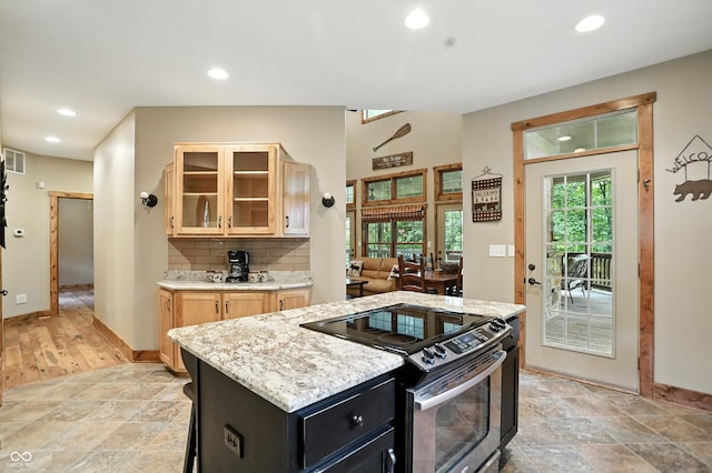 7563 Grizzly Dr, Nineveh, IN 46164 - kitchen with stainless steel electric range oven, recessed lighting, decorative backsplash, glass insert cabinets, and dark cabinetry
