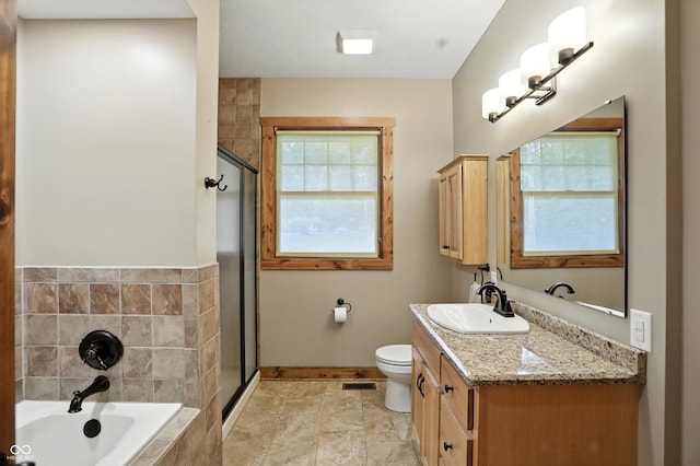 7563 Grizzly Dr, Nineveh, IN 46164 - bathroom featuring healthy amount of natural light, a bath, vanity, and a stall shower