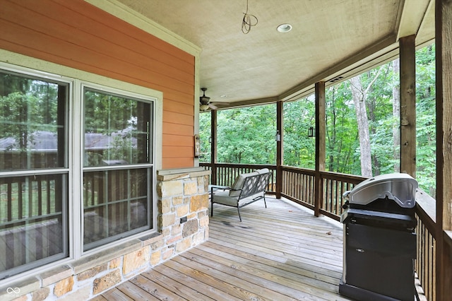 7563 Grizzly Dr, Nineveh, IN 46164 - wooden terrace with grilling area and a ceiling fan