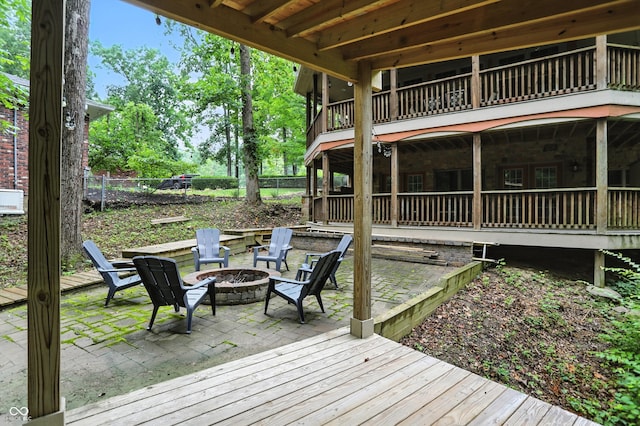 7563 Grizzly Dr, Nineveh, IN 46164 - wooden terrace with an outdoor fire pit and a patio