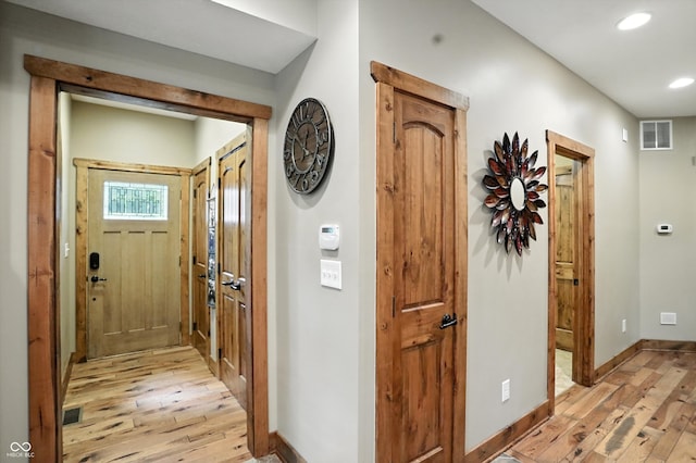 7563 Grizzly Dr, Nineveh, IN 46164 - entrance foyer with light wood-style flooring and recessed lighting