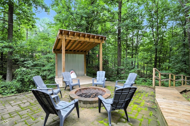 7563 Grizzly Dr, Nineveh, IN 46164 - view of patio with an outdoor fire pit