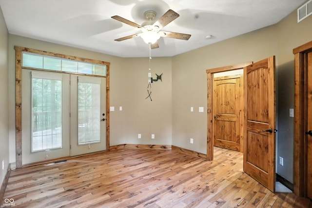 7563 Grizzly Dr, Nineveh, IN 46164 - entrance foyer with healthy amount of natural light, light wood-style flooring, and ceiling fan