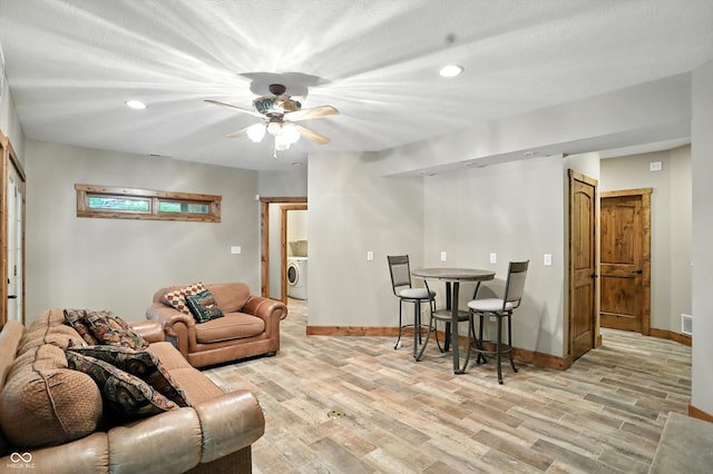 7563 Grizzly Dr, Nineveh, IN 46164 - living area featuring washer / clothes dryer, light wood-type flooring, ceiling fan, and recessed lighting