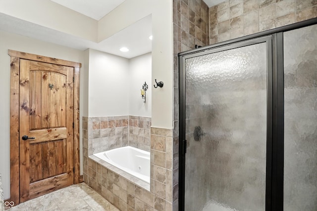 7563 Grizzly Dr, Nineveh, IN 46164 - bathroom with a jetted tub and a shower stall