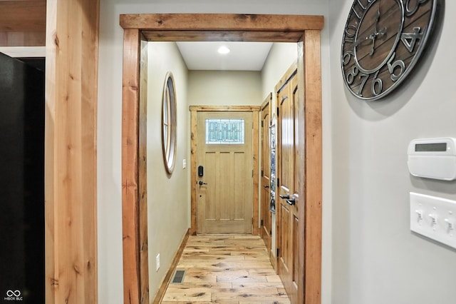 7563 Grizzly Dr, Nineveh, IN 46164 - doorway featuring light wood-style flooring and recessed lighting