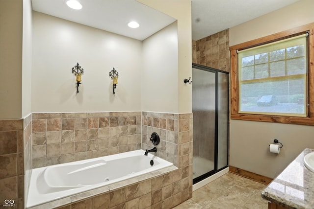 7563 Grizzly Dr, Nineveh, IN 46164 - bathroom featuring a stall shower, a tub with jets, and vanity