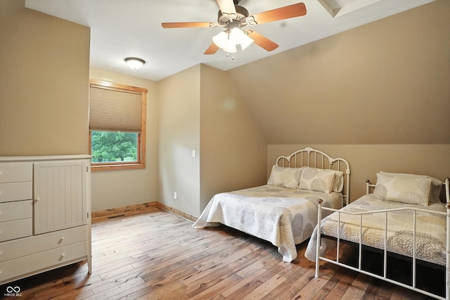 7563 Grizzly Dr, Nineveh, IN 46164 - bedroom with vaulted ceiling, hardwood / wood-style flooring, and ceiling fan