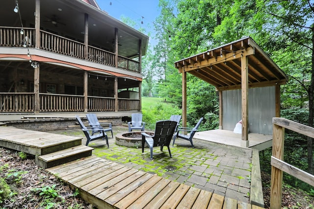 7563 Grizzly Dr, Nineveh, IN 46164 - wooden deck with an outdoor fire pit and ceiling fan