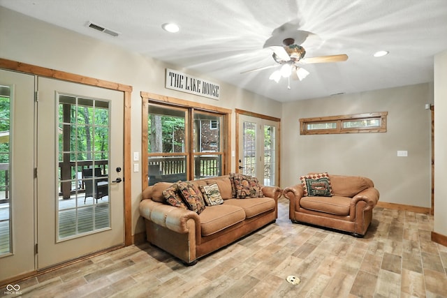 7563 Grizzly Dr, Nineveh, IN 46164 - living room featuring healthy amount of natural light, light wood-style floors, ceiling fan, and recessed lighting
