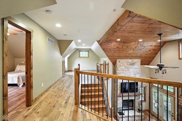 7563 Grizzly Dr, Nineveh, IN 46164 - hallway with light wood-style floors, an upstairs landing, lofted ceiling, and recessed lighting