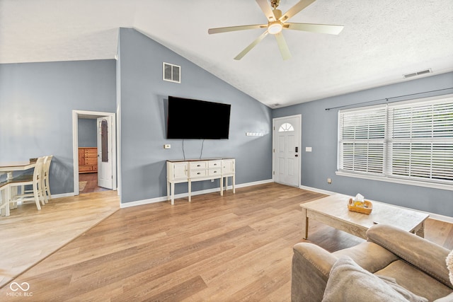 3914 Chenango Pl, West Lafayette, IN 47906 - living area with lofted ceiling, wood finished floors, and a ceiling fan